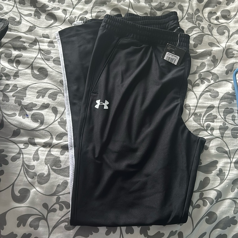 Men’s under armour pants, tags on. Large